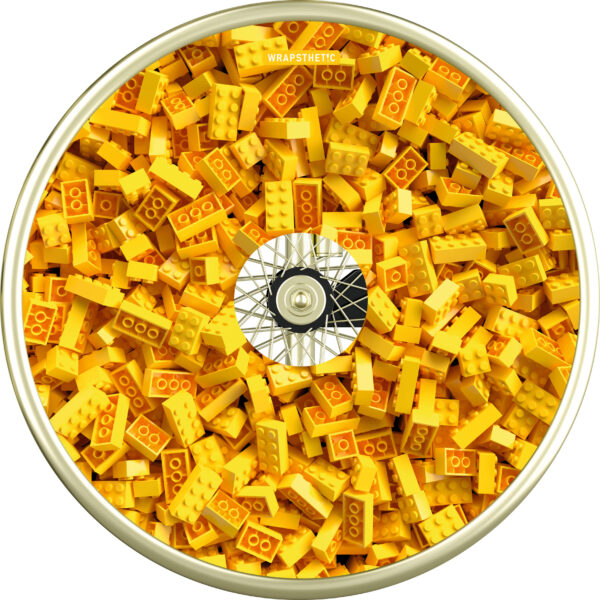 Wheelchair cover if close up photo of yellow Lego bricks